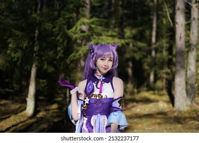 girl cosplay keqing genshin impact on the forest background