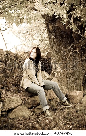 Similar – Woman with a bike in the middle of the forest.