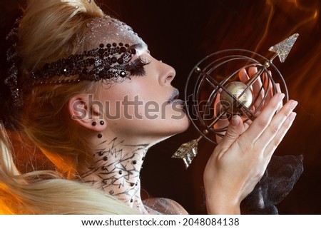 girl with creative makeup. girl sagittarius. zodiac sign sagittarius