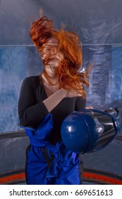 Girl With Curly Hair In A Wind Tunnel