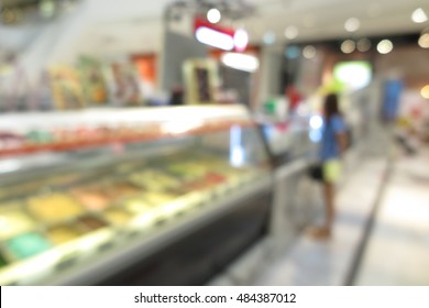 Girl Customer Buy Ice Cream At Ice Cream Cafe Shop, Blur Abstract Background Concept