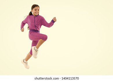 Girl Cute Kid With Long Ponytails Sportive Costume Jump Isolated On White. Working Out With Long Hair. Sport For Girls. Guidance On Working Out With Long Hair. Deal With Long Hair While Exercising.