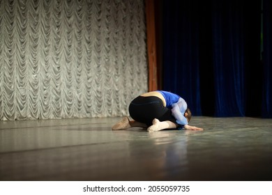 The Girl Dances On Stage. Dance Movement. Choreography Lesson. The Woman Performs Solo.