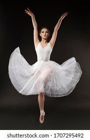 girl dancing ballet; girl in a tutu; Beautiful dancing girl; Beautiful dancing girl in Pointe shoes