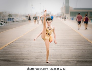 Girl Dancing On A Boardwalk With A Kick Dance Recital