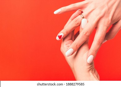 Girl Demonstrates A Wedding Or Engagement Ring On Her Finger. Greeting Card With Place For Text Or Invitation.