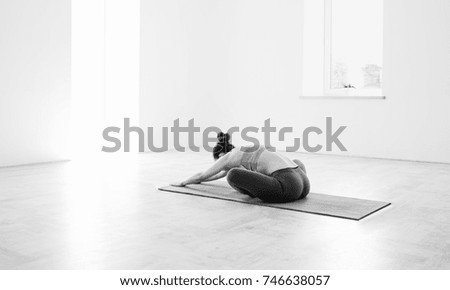 Similar – Image, Stock Photo young caucasian woman doing fitness on mat at home