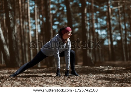 Similar – Image, Stock Photo Young man exercising outdoors in a forest