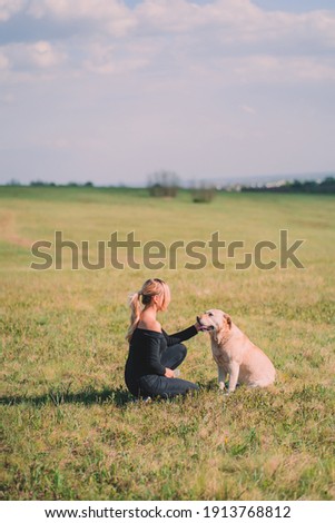 Similar – Image, Stock Photo Loving young woman offered a paw by her dog