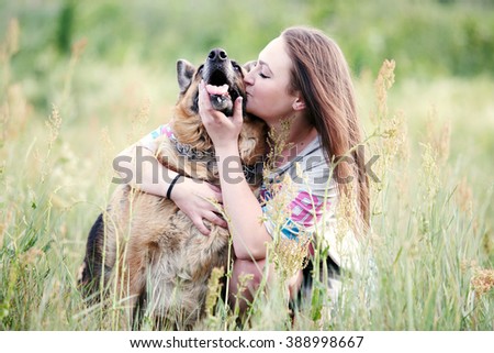 Similar – Image, Stock Photo Happy smiling dog with its pretty young owner