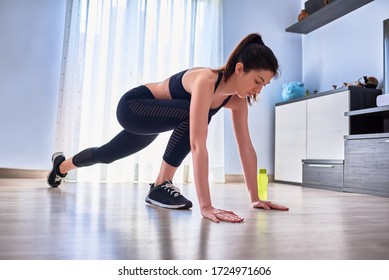 Girl doing exercise at home - Powered by Shutterstock