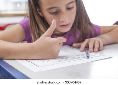 Girl Doing The Exercise Of Math