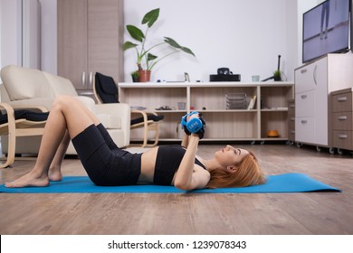 Girl Doing Home Chest Workout With Dumbbels. Girl Getting In Shape,