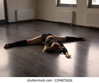 Girl Is Doing Middle Split On The Floor In Yoga Class