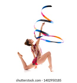 Girl doing rhythmic gymnastics with ribbon - Powered by Shutterstock