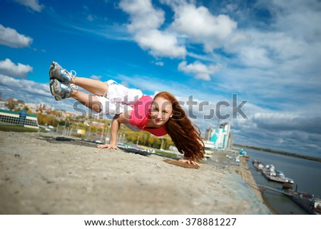 girl doing yoga on the roof