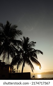 Girl Doing Yoga At Sunrise In Sri Lanka Near Galle Fort Lighthouse