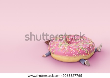 Girl with  donut. Fast food concept, overweight. Minimal pink background with copy space