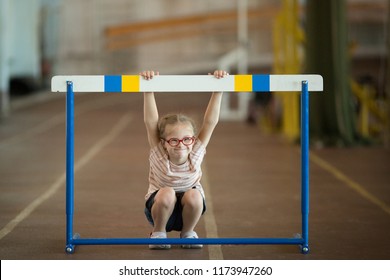 A Girl With Down Syndrome Is Involved In Athletics