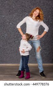 Girl With Down Syndrome Playing With Mom