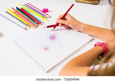 Girl Drawing A Colorful Flower First Person View