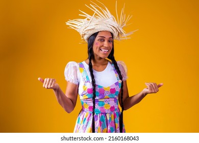Girl dressed in typical clothes for the Brazilian June party 