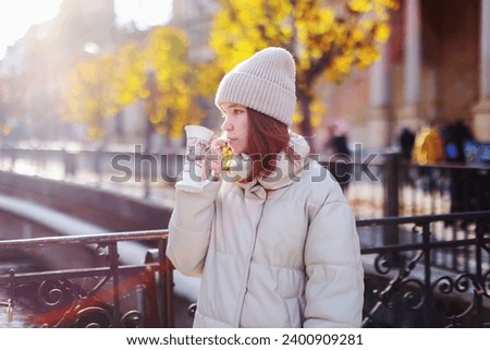 girl drink mineral water in resort town Karlovy Vary
