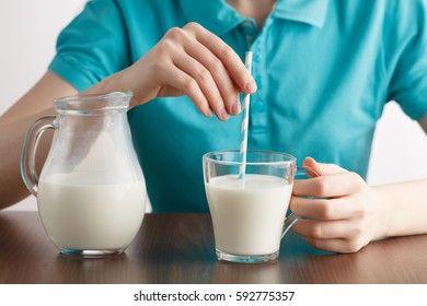 girl drinking healthy lifestyle milk food with straw - Shutterstock ID 592775357