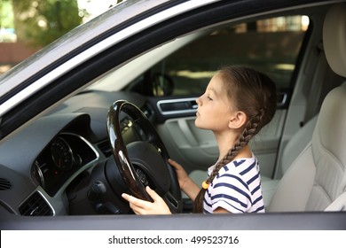 Girl Driving Parent Car