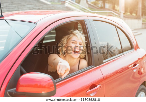 girl in a driving\
school