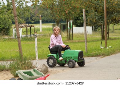 Girl Driving Tractor