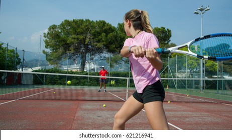 A Girl During A Tennis Lesson