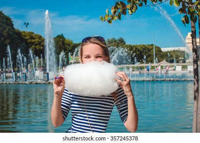 Girl Eating Cotton Candy