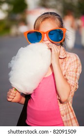 Girl Eating Cotton Candy