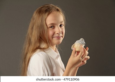 Girl Eating Cupcake