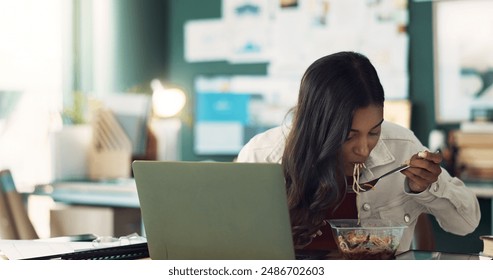 Girl, eating and food in home office with laptop for online, remote work and lunch break for hunger or multitasking. Female freelancer, internet and noodles with salad for heathy diet and brunch. - Powered by Shutterstock