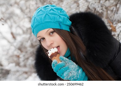 Girl Eating Ice Cream In Winter