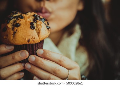 Girl Eating Muffin