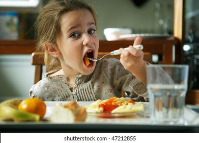 Girl Eating Pasta