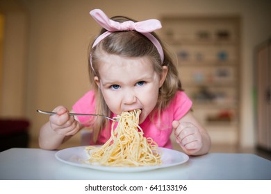 Girl Eating Pasta