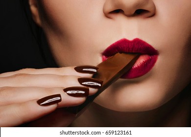 Girl Eats Chocolate