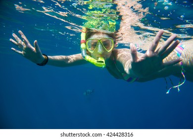 Girl Engaged In Snorkeling In The Red Sea In Egypt