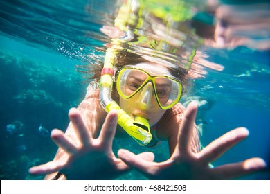 Girl Engaged In Snorkeling In The Red Sea In Egypt