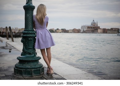 Girl enjoying evening in Venice