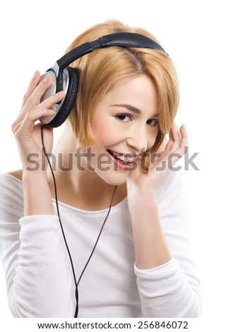 Similar – Blonde woman listening to music with her headphones