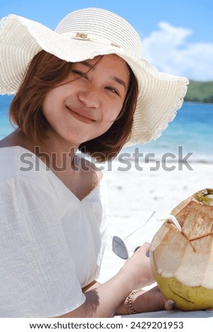 a girl enjoying a holiday on the beautiful Lombok beach with a tropical climate, travel concept