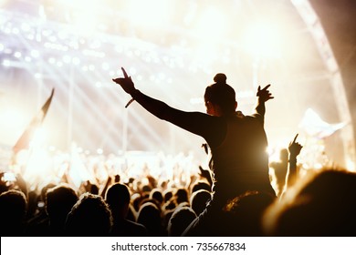 Girl enjoying the outdoor music festival concert. - Powered by Shutterstock