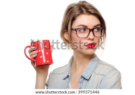 girl enjoys her cup of tea on white background