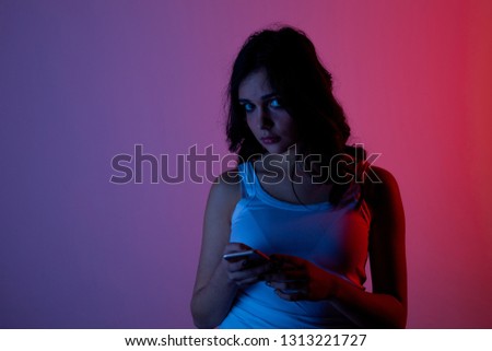 girl excessively sitting at the phone at home. he is a victim of online bullying Stalker social networks