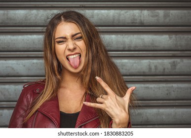Girl expression with tongue, griely grimace.